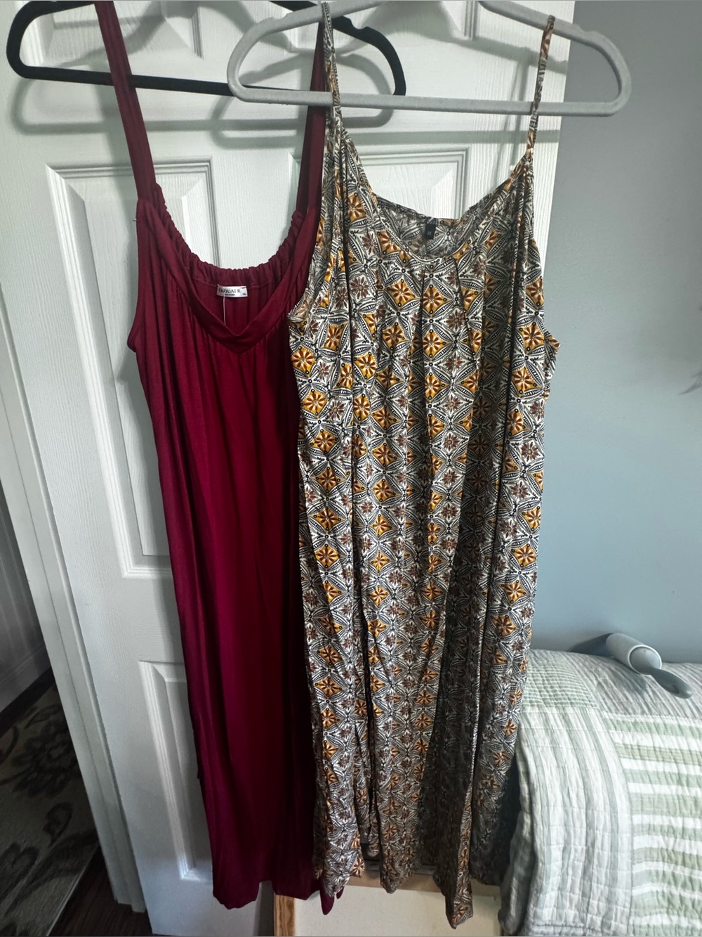 2 Maxi Dresses one 3X and one XXL but they fit about the same way
